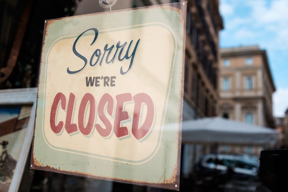 sign reading sorry we are closed